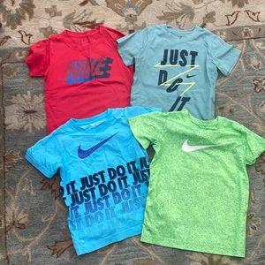 Size 7 (large) boys nike t shirts.